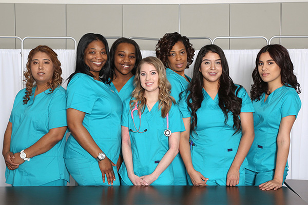 yolo-600x400-36 Group of nurses wearing blue scrubs